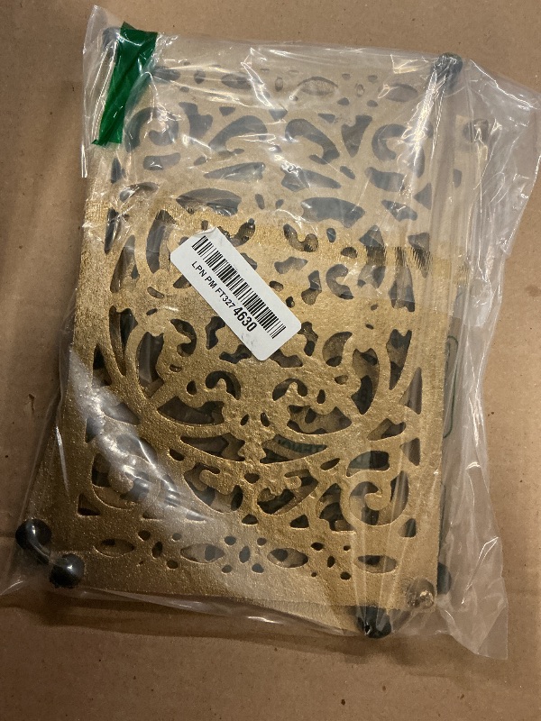 Photo 1 of Sumnacon 2 Pack Cast Iron Trivet, 9.6x6.3 Inch Metal Trivets with Rubber Feet, Heat Resistant Trivets for Hot Dish Pot Pan Teapot, Rustic Cast Iron Accessories for Kitchen Cooktop Dining Table, Gold