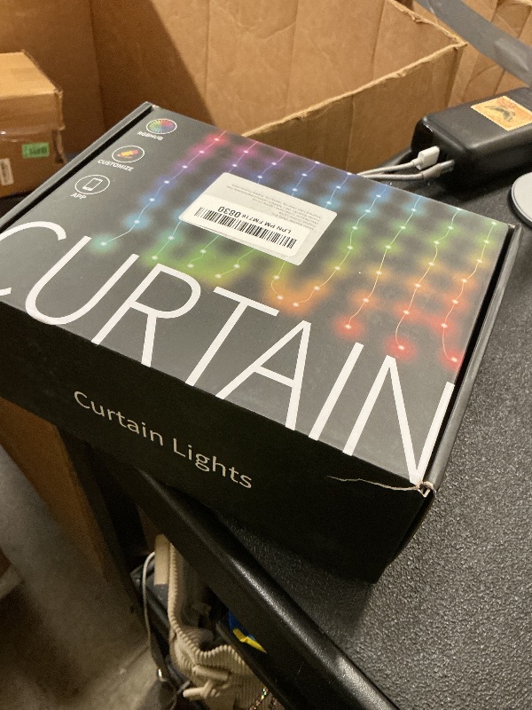 Photo 1 of CCILAND Smart 800LED Curtain Lights 20Ft x 10Ft with App Programmable, Color Changing Dynamic Curtain String Lights Music Sync for Backdrop Decor