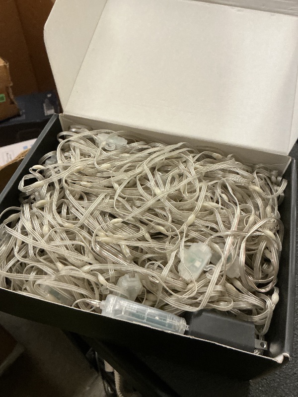 Photo 1 of CCILAND Smart 800LED Curtain Lights 20Ft x 10Ft with App Programmable, Color Changing Dynamic Curtain String Lights Music Sync for Backdrop Decor