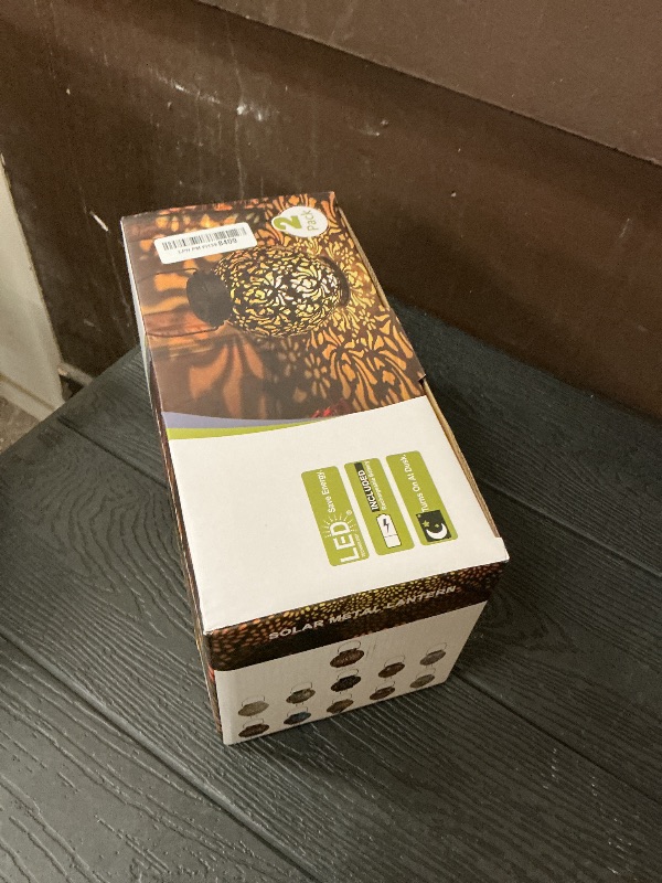 Photo 1 of 2 Pack Outdoor Solar Hanging Lantern Lights Metal LED Decorative Lamp for Garden Patio Courtyard Lawn and Table with Hollowed-Out Design (Sunset Blaze)