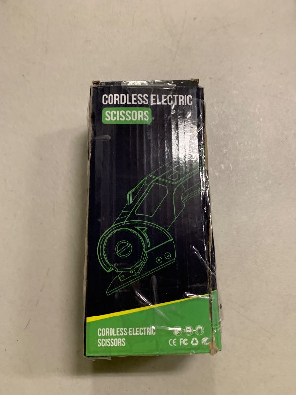 Photo 1 of 4V Rechargeable Rotary Cordless Electric Scissors ( purple ) part number?DDJD-gr0115-L119 color?purple model number?EC0601 size?Large unit count?3.0