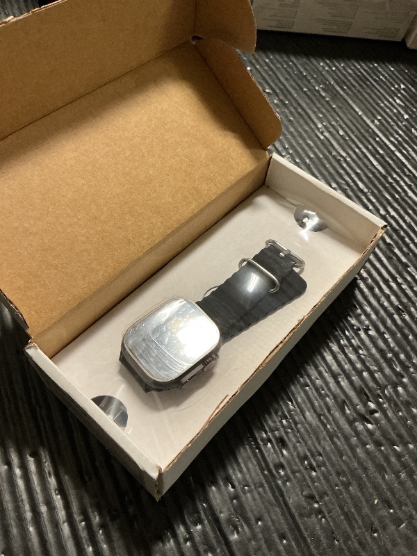 Photo 1 of Apple Watch Ultra 2 (GPS + Cellular, 49MM) - Black Titanium Case with Black Ocean Band (Renewed)