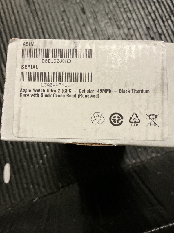 Photo 1 of Apple Watch Ultra 2 (GPS + Cellular, 49MM) - Black Titanium Case with Black Ocean Band (Renewed)