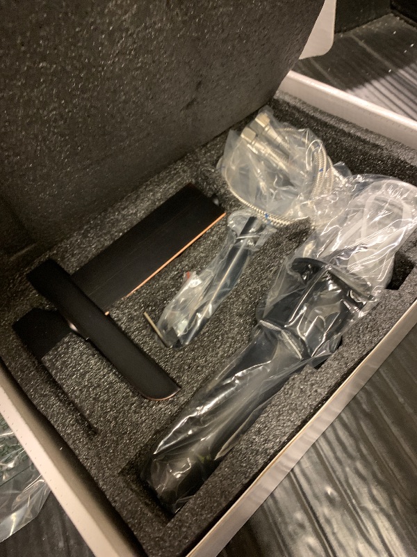 Photo 1 of BATHLAVISH Oil Rubbed Bronze Waterfall Bathroom Faucet Single Hole Bathroom Sink Faucet Modern Single Handle Vanity Lavatory Faucets with Pop Up Drain Lavatory Mixer Tap