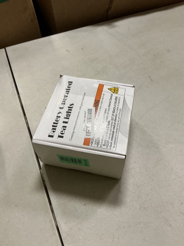 Photo 1 of Homemory 50-Pack Flameless LED Tea Lights Candles Battery Operated, 200+Hour Fake Electric Candles TeaLights for Votive, Halloween, Ofrenda, Diya, Wedding Centerpiece Table Decor, Funeral, Christmas