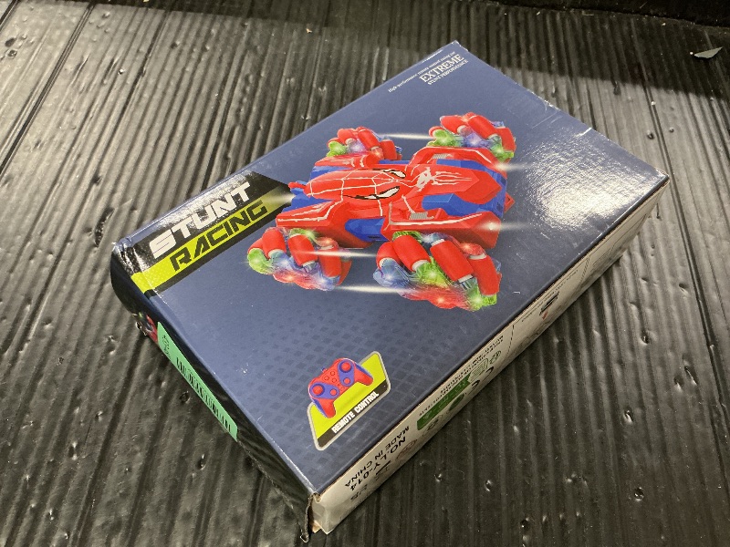 Photo 1 of Punieayi Spider Remote Control Car, 2.4Ghz RC Cars with Headlight Double Sided Off-Road 360° Rotating Rechargeable 4WD RC Stunt Car Indoor Outdoor Spider Toys for Boys 4-6 5-7 8-13