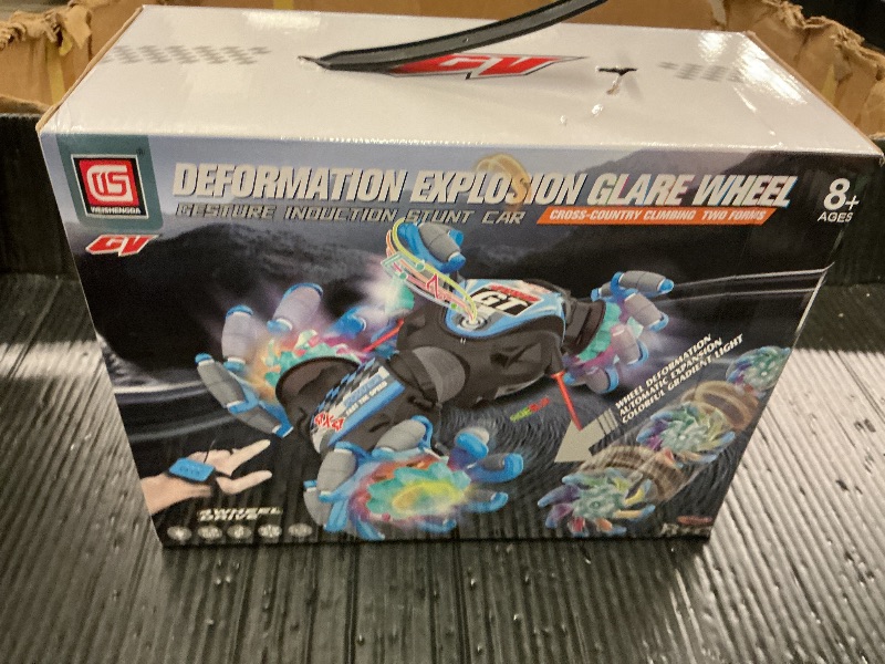 Photo 1 of 1:12 Gesture Sensing RC Stunt Car, 2-in-1 Hand Controlled Remote Control Twist Cars with Light & Music, 4WD 360° Rotate Transform Drift, Gifts for 6-8-12 Kids Age 6 7 8 9 10 11 12 Yrs Old?