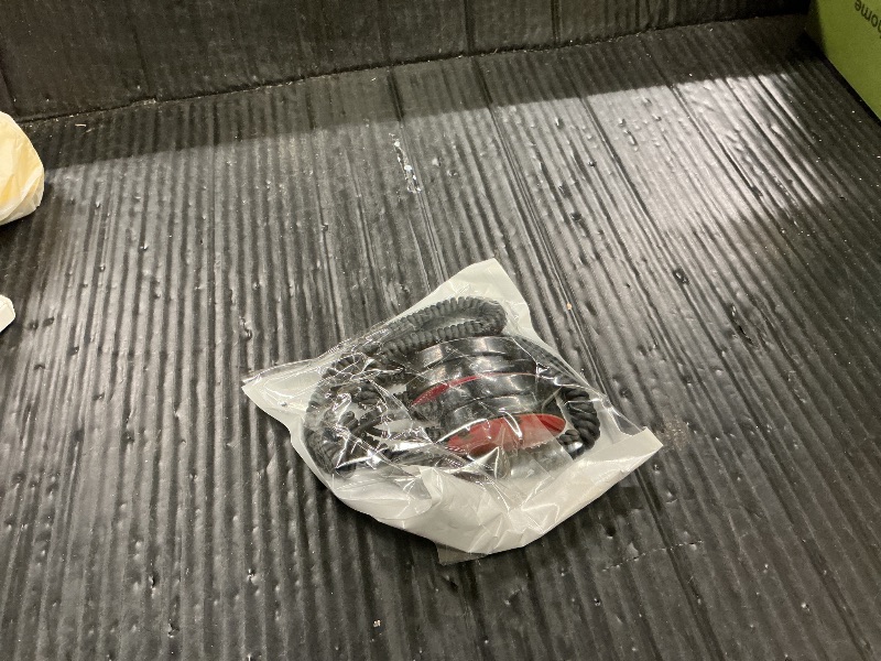 Photo 1 of 2-Pack Magnetic Remote Control Holders with Spring Ropes - Safely Secure Remotes & Small Items, Wall-Mount with Adhesive, Anti-Loss, Rapid Adsorption, Extendable Spring (Black 70 inch, 2 Pack)