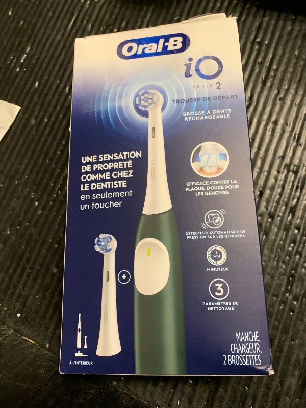 Photo 1 of NON FUNCTIONAL - PARTS ONLY ------------------------------------------Oral-B iO Series 2 Rechargeable Electric Powered Toothbrush Starter Kit, Forest Green with 2 Brush Heads - Automatic Pressure Sensor to Protect Gums - 3 Modes - 2 Min Timer