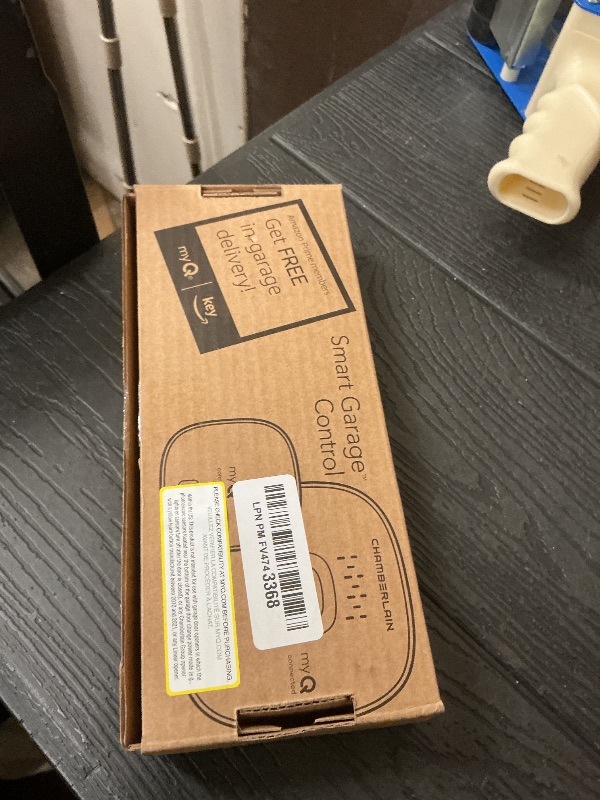 Photo 1 of CHAMBERLAIN Smart Garage Control - Wireless Garage Hub and Sensor with Wifi & Bluetooth - Smartphone Controlled, myQ-G0401-ES, White