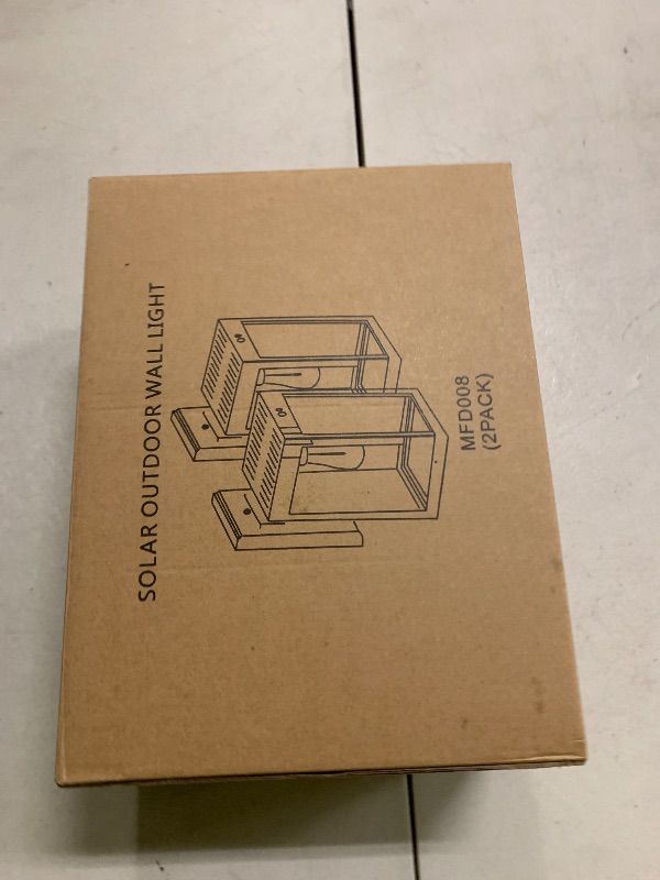 Photo 1 of MDENLT 2 Pack Solar Porch Lights Outdoor,Solar Wall Lights with 3 Lighting Modes&Motion Sensor, Dusk to Dawn Sconce Lights Wall Mount,Exterior Wall Lantern Light Fixture for House, Garage,Patio,Shed