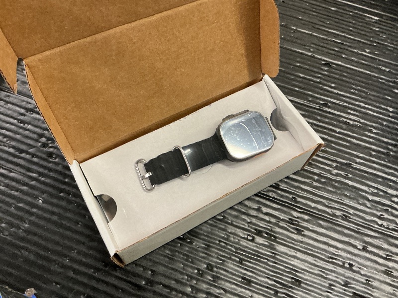 Photo 1 of Apple Watch Ultra 2 (GPS + Cellular, 49MM) - Black Titanium Case with Black Ocean Band (Renewed)