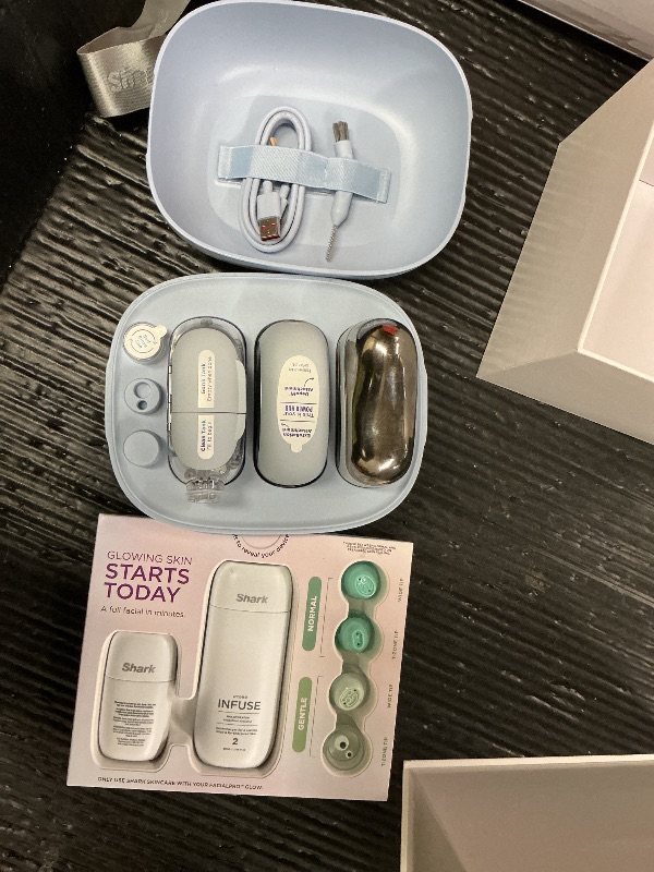 Photo 1 of Shark FacialPro Glow at-Home Hydro-Powered Facial System with DePuffi Hot & Cold Therapy – Professional Spa Skincare Device for Pore Cleansing, Hydration, & Radiant Glow, Blue, FH320