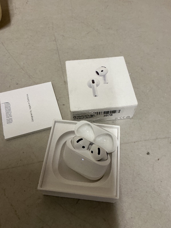 Photo 1 of Apple AirPods 4 Wireless Earbuds, Bluetooth Headphones, with Active Noise Cancellation, Adaptive, Transparency Mode, Personalized Spatial Audio, USB-C Charging Case, Wireless Charging, H2 Chip