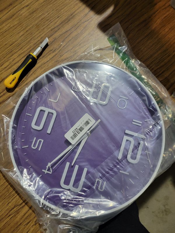 Photo 1 of 12 inch Silent and Non tick Battery Powered Quartz Round Wall Clock, Blue Modern Decorative Clock, Suitable for Home, Office, Bedroom (Purple;)