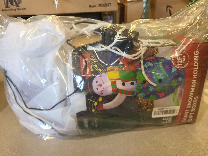 Photo 1 of 12FT Giant Christmas Inflatables Snowman Decorations Built-in Music Box & 360° Rotation 3-Colored LEDs Huge Christmas Inflatable Large Tall Snowman Christmas Blow Ups Decoration Outdoor Xmas New Year