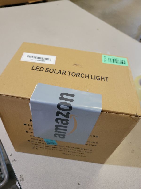 Photo 1 of 10 Pack Solar Lights Outdoor, Mini Solar Torch Lights with Flickering Flame for Christmas Decor, Solar Christmas Lights Waterproof Solar Powered Outdoor Lights for Garden Pathway Patio Yard Porch