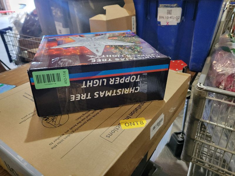 Photo 1 of 10" Christmas Tree Topper Projector with 6 Projection Modes, Lighted Christmas Tree Topper Star Built-in LED Rotation Light, 3D Glitter Dynamic TreeTop for Xmas Holiday Party Decorations Gift (Silver)