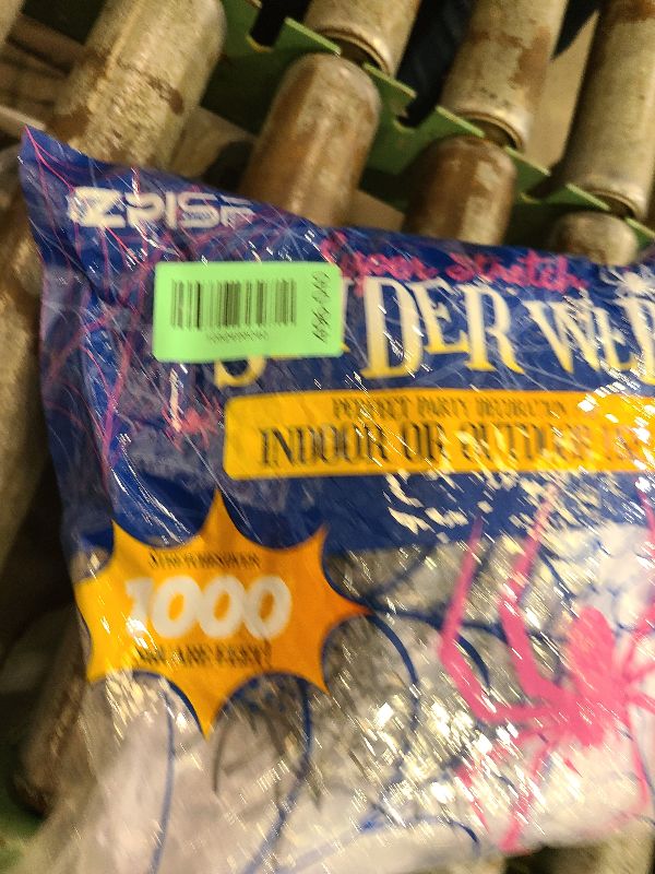 Photo 1 of 1000 sqft Spider Webs Halloween Decorations Bonus with 30 Fake Spiders, Super Stretch Cobwebs for Halloween Indoor and Outdoor Party Supplies