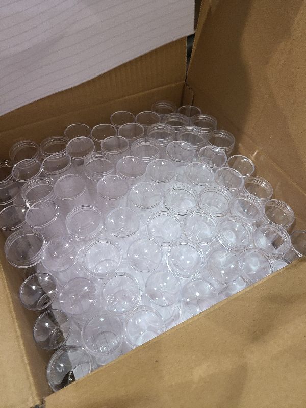 Photo 1 of 100 Pack 1 oz Mini Plastic Spice Jars with White Caps Bulk Clear Empty Spice Bottles with Sifters Small Refillable Seasoning Containers for Kitchen Home Travel