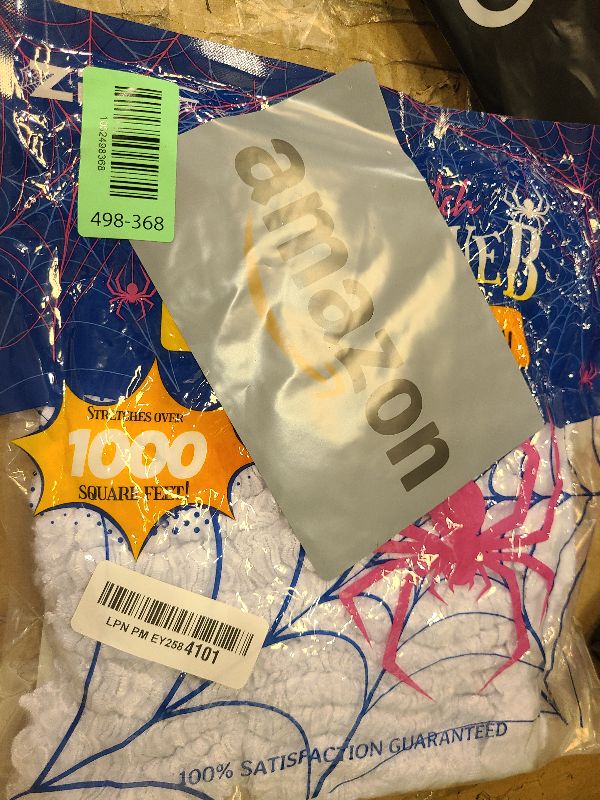 Photo 1 of 1000 sqft Spider Webs Halloween Decorations Bonus with 30 Fake Spiders, Super Stretch Cobwebs for Halloween Indoor and Outdoor Party Supplies