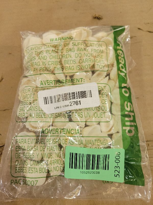 Photo 1 of 140Pcs Tiny Sea Shells - 0.8-1.2 inches Natural Small White Clam Shells for Crafts Bulk for Home Decor, Beach Theme Party, Fish Tank Vase Filler, Bracelet Making