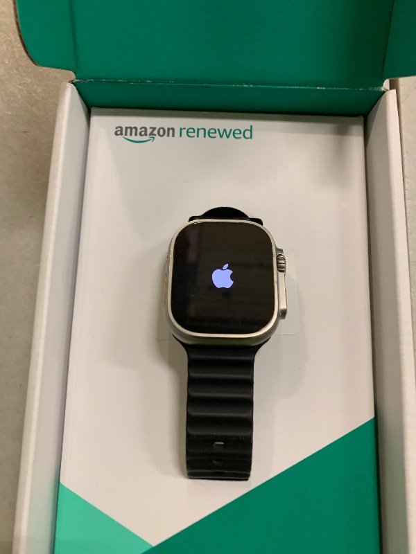 Photo 1 of Apple Watch Ultra [GPS + Cellular 49mm] Titanium Case with Midnight Ocean Band, One Size (Renewed Premium)