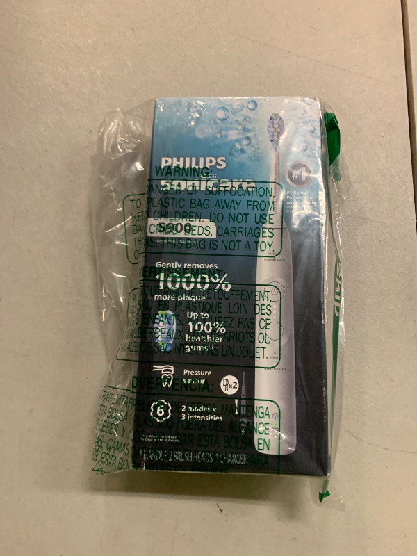 Photo 1 of Philips Sonicare 5900 Series Electric Toothbrush - Next-Generation Sonicare Technology, Pressure Sensor, 6 Brushing Settings, SmarTimer, BrushPacer, 21-Day Runtime, White, Model HX7130/02