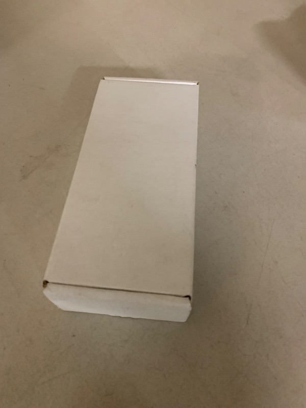 Photo 1 of Apple Watch Ultra 2 (GPS + Cellular, 49MM) - Black Titanium Case with Black Ocean Band (Renewed)