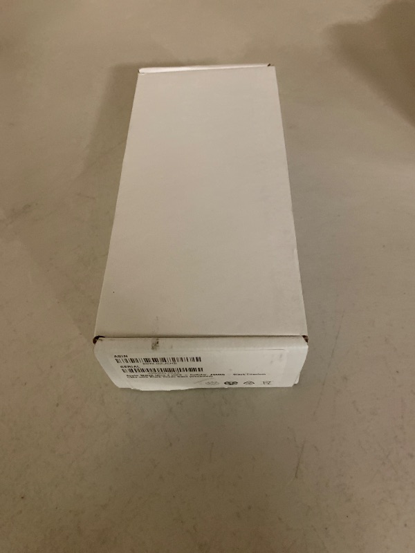 Photo 1 of Apple Watch Ultra 2 (GPS + Cellular, 49MM) - Black Titanium Case with Black Ocean Band (Renewed)