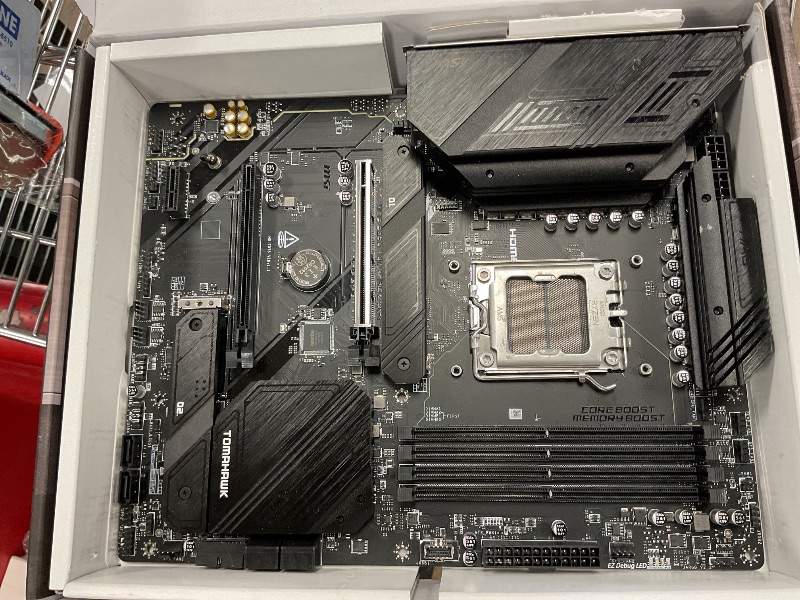 Photo 1 of MSI MAG B650 Tomahawk WiFi Gaming Motherboard (AMD Ryzen 9000/8000/7000 Series Processors, AM5, DDR5, PCIe 4.0, M.2, SATA 6Gb/s, USB 3.2 Gen 2, HDMI/DP, Wi-Fi 6E, Bluetooth 5.3, 2.5Gbps LAN, ATX)