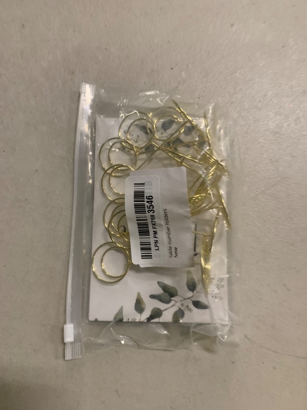 Photo 1 of 10 Pack Gold Table Number Holders with Floral Cards, 3.5” Place Card Holders for Table at Weddings, Events & Restaurants, Elegant Photo Holders for Centerpieces, Sturdy Stands with Spiral Clip Design