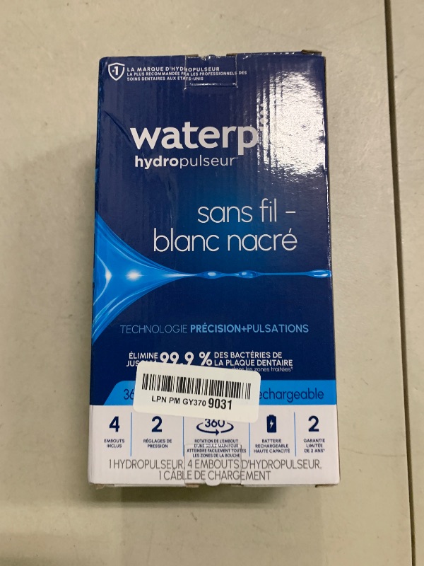 Photo 1 of Waterpik Cordless Pearl Rechargeable Portable Water Flosser for Teeth, Gums, Braces Care and Travel with 4 Flossing Tips - ADA Accepted, WF-13 Black, Packaging May Vary