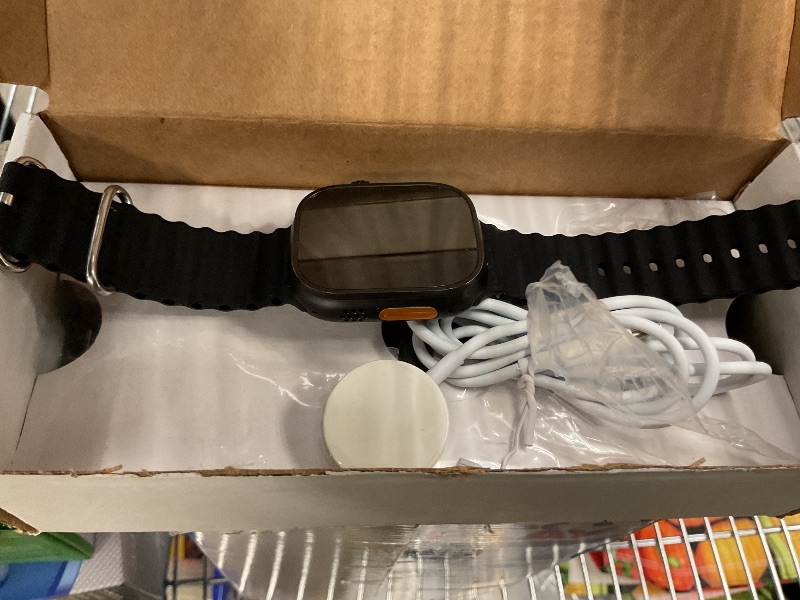 Photo 1 of Apple Watch Ultra 2 (GPS + Cellular, 49MM) - Black Titanium Case with Black Ocean Band (Renewed)