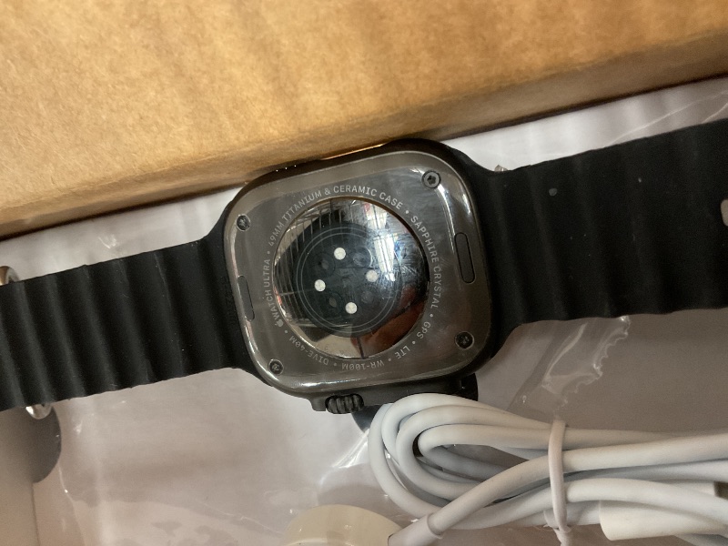 Photo 1 of Apple Watch Ultra 2 (GPS + Cellular, 49MM) - Black Titanium Case with Black Ocean Band (Renewed)