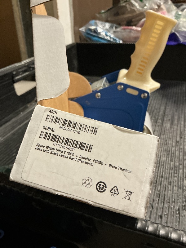 Photo 1 of Apple Watch Ultra 2 (GPS + Cellular, 49MM) - Black Titanium Case with Black Ocean Band (Renewed)