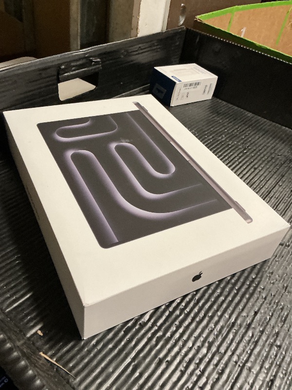 Photo 1 of Apple 2024 MacBook Pro Laptop with M4 Pro, 12?core CPU, 16?core GPU: Built for Apple Intelligence 14.2-inch Liquid Retina XDR Display, 24GB Unified Memory, 512GB SSD Storage; Space Black