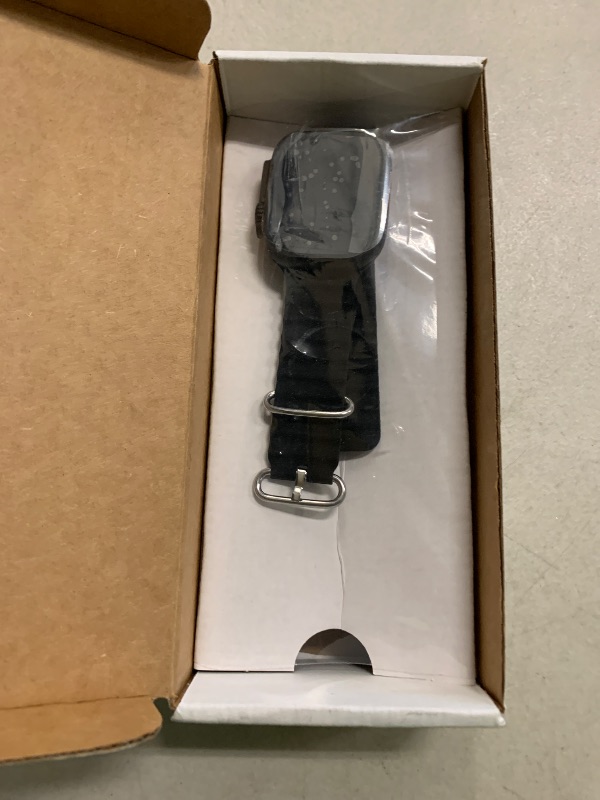 Photo 1 of Apple Watch Ultra 2 (GPS + Cellular, 49MM) - Black Titanium Case with Black Ocean Band (Renewed)