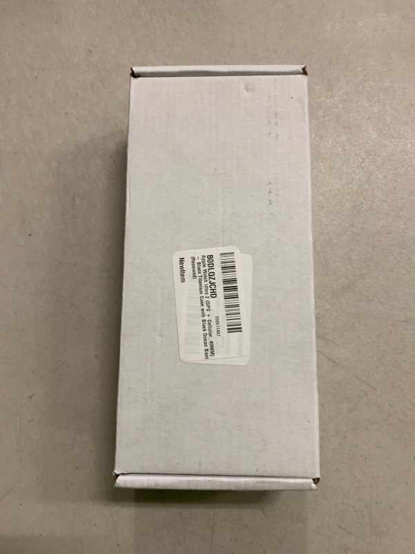 Photo 1 of Apple Watch Ultra 2 (GPS + Cellular, 49MM) - Black Titanium Case with Black Ocean Band (Renewed)