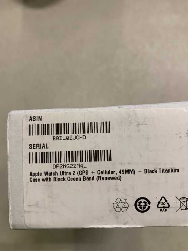 Photo 1 of Apple Watch Ultra 2 (GPS + Cellular, 49MM) - Black Titanium Case with Black Ocean Band (Renewed)