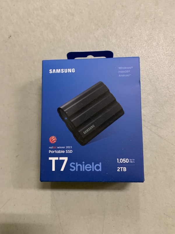 Photo 1 of Samsung T7 Shield 2TB, Portable SSD, up-to 1050MB/s, USB 3.2 Gen2, Rugged,IP65 Water & Dust Resistant, for Photographers, Content Creators and Gaming, Extenal Solid State Drive (MU-PE2T0S/AM), Black