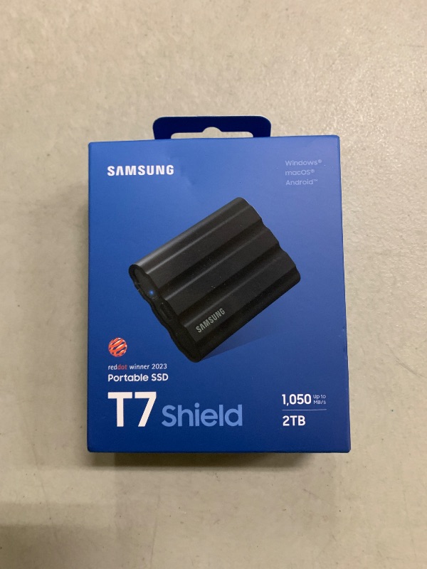 View 2 of Samsung T7 Shield 2TB, Portable SSD, up-to 1050MB/s, USB 3.2 Gen2, Rugged,IP65 Water & Dust Resistant, for Photographers, Content Creators and Gaming, Extenal Solid State Drive (MU-PE2T0S/AM), Black