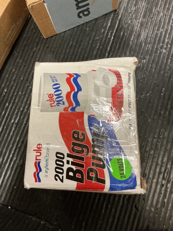 Photo 1 of Rule 12 Marine Bilge Pump, 2000 Gallon Per Hour, Non-Automatic, 24 Volt DC , White/Blue