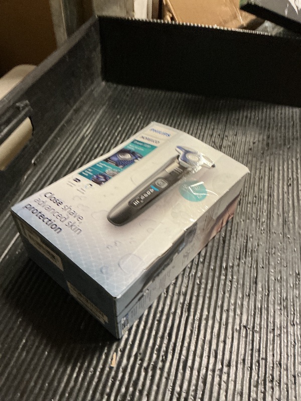 Photo 1 of Philips Norelco Shaver 7200, Rechargeable Wet & Dry Electric Shaver with SenseIQ Technology and Pop-up Trimmer, S7887/82
