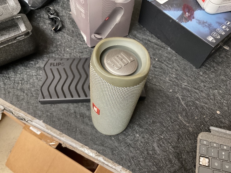 Photo 1 of *****DOES NOT WORK BROKEN, FOR PARTS ONLY******
JBL FLIP 5, Waterproof Portable Bluetooth Speaker, Gray