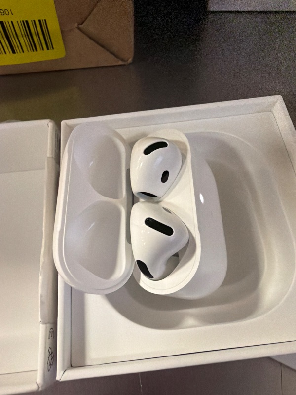 Photo 4 of Apple AirPods 4 Wireless Earbuds, Bluetooth Headphones, with Active Noise Cancellation, Adaptive, Transparency Mode, Personalized Spatial Audio, USB-C Charging Case, Wireless Charging, H2 Chip