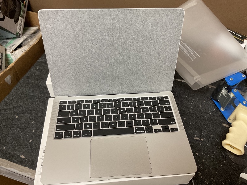 Photo 1 of SEE NOTES AND PICTURES…………2020 Apple MacBook Air Laptop: Apple M1 Chip, 13” Retina Display, 8GB RAM, 256GB SSD Storage, Backlit Keyboard, FaceTime HD Camera, Touch ID. Works with iPhone/iPad; Silver