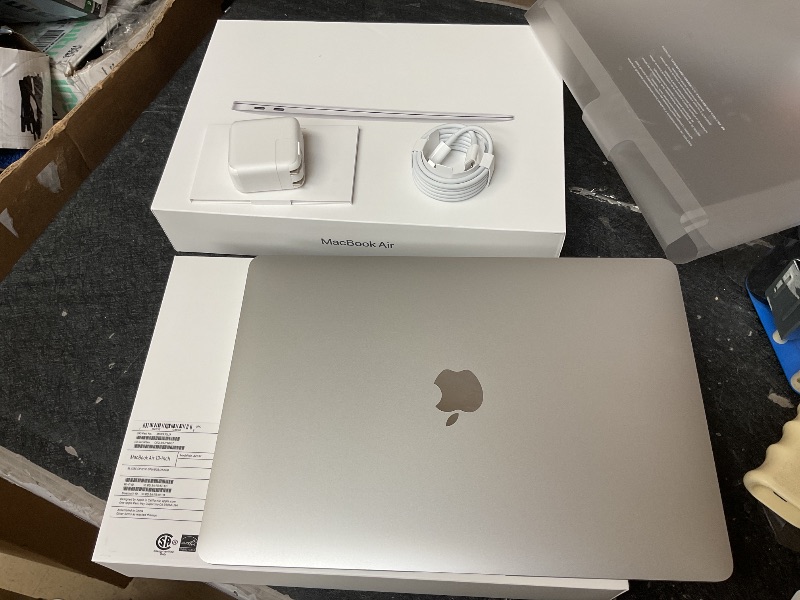 Photo 1 of SEE NOTES AND PICTURES…………2020 Apple MacBook Air Laptop: Apple M1 Chip, 13” Retina Display, 8GB RAM, 256GB SSD Storage, Backlit Keyboard, FaceTime HD Camera, Touch ID. Works with iPhone/iPad; Silver