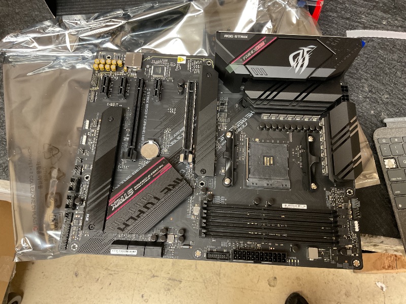 Photo 1 of ASUS ROG Strix Z890-E Gaming WiFi Intel® Z890 LGA 1851 ATX Motherboard, Advanced AI PC-Ready, 18+2+1+2 Stages, DDR5, WiFi 7, 7X M.2, Thunderbolt™ 4, USB Type-C®, AI Overclocking, Cooling & Networking