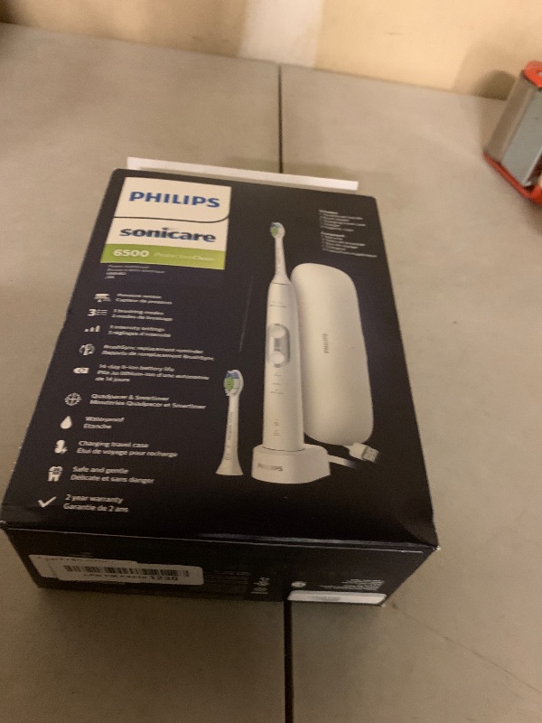 Photo 1 of Philips Sonicare ProtectiveClean 6500 Rechargeable Electric Toothbrush, with Pressure Sensor, 3 Cleaning Modes, SmarTimer and QuadPacer, 14-Day Battery Life, Charging Travel Case, White, HX6462/05